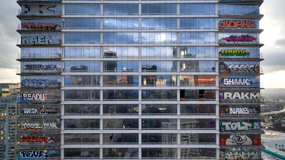 Taggers have graffitied what appears to be more than 25 stories of a downtown Los Angeles skyscraper.